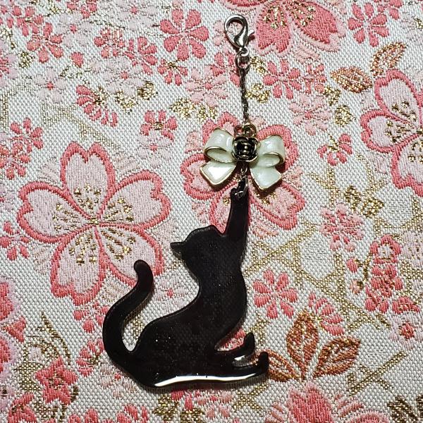 黒猫チャーム E
