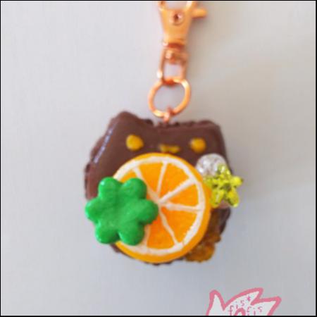 ねこまかろん(チョコ)/オレンジ＆リボン